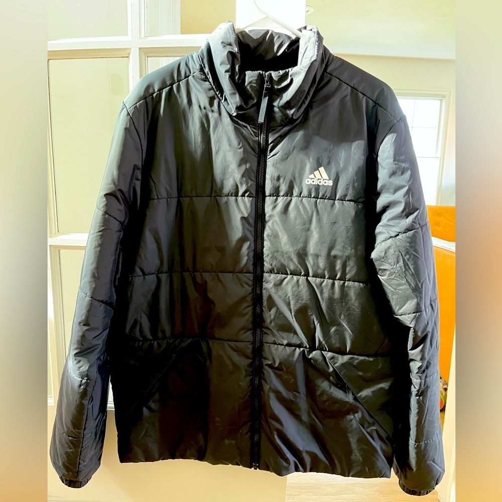 Adidas light down alternative puffer coat in black.
